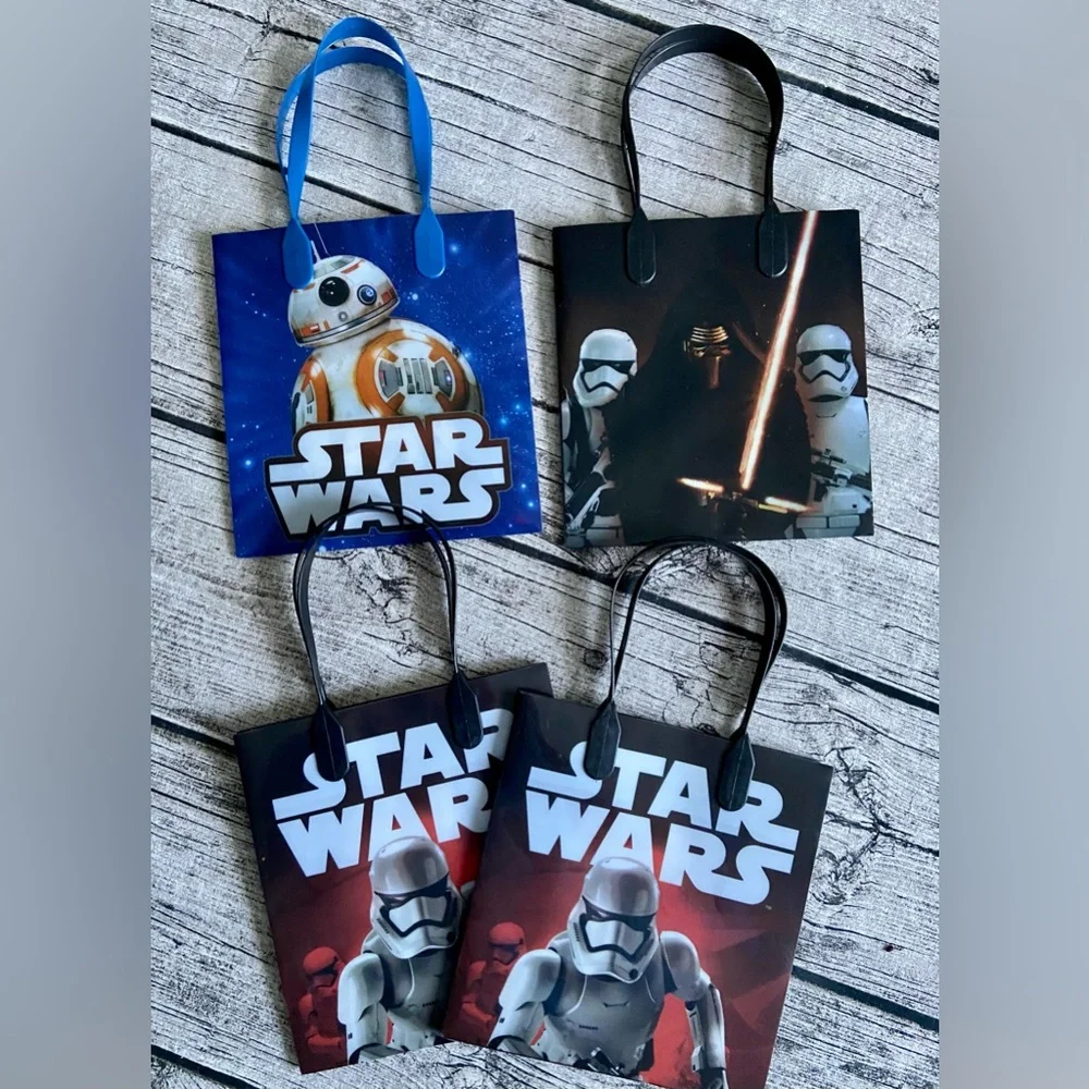 NEW. $3.00 each! Bundle of 4 Star Wars plastic gift/favor bags with handles